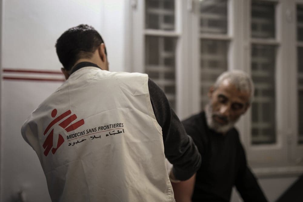 Doctors Without Borders/Médecins Sans Frontières (MSF) doctor performing a minor surgery at the MSF clinic in Gaza City.